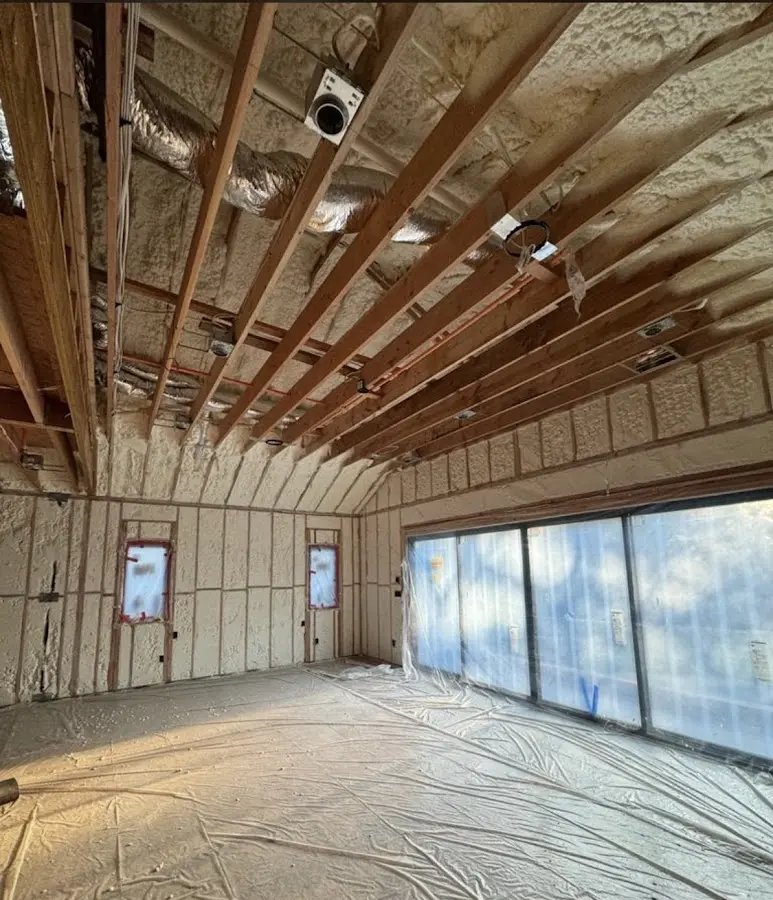 Interior walls and ceiling insulated with spray foam during new construction in Aventura
